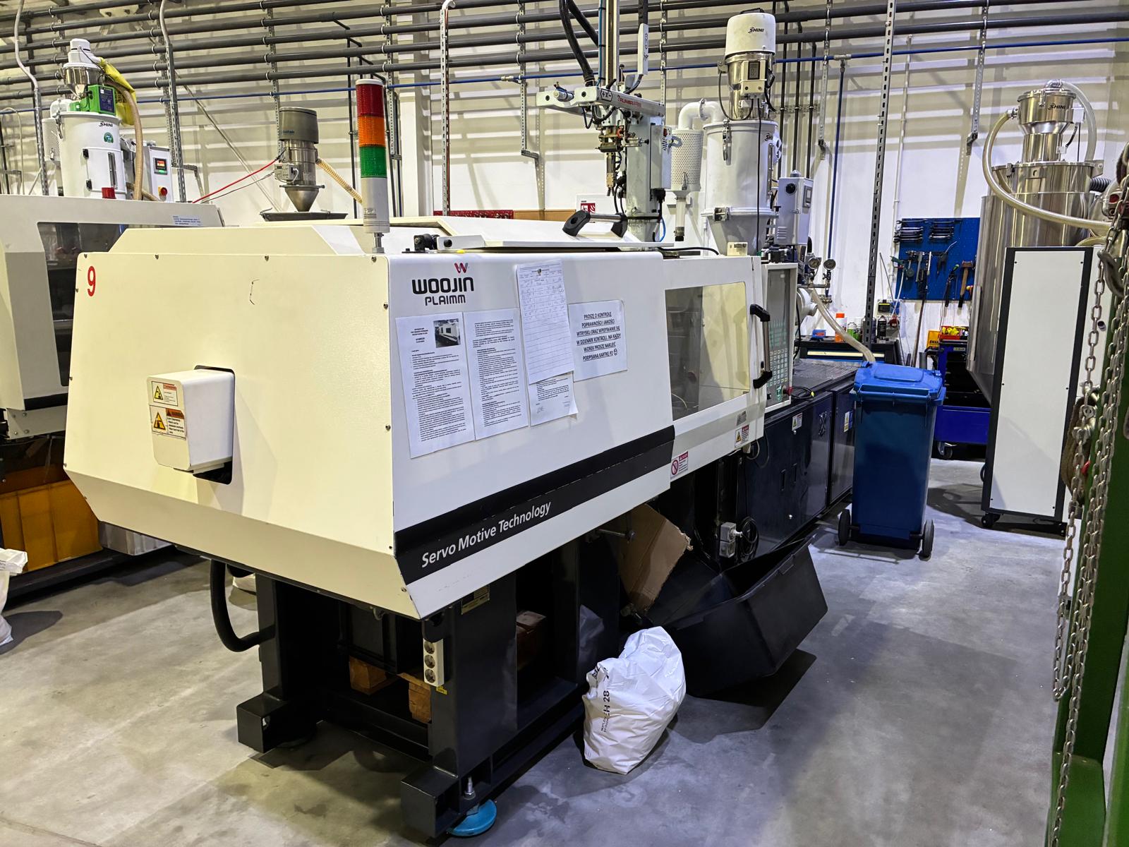 Woojin 110T injection molding machine